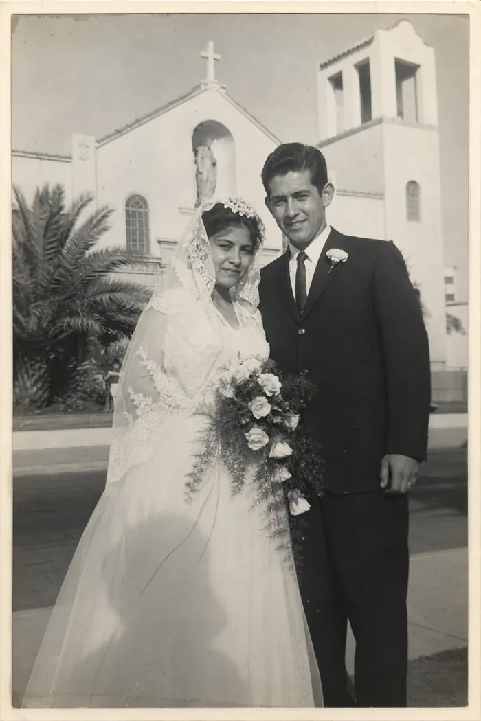 A black and white wedding photo from the 1960s